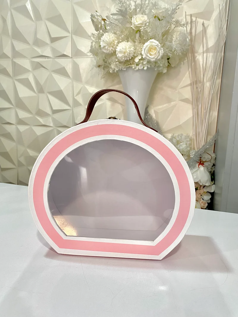 Boite ovale rose avec anse en cuir marron | taille M
