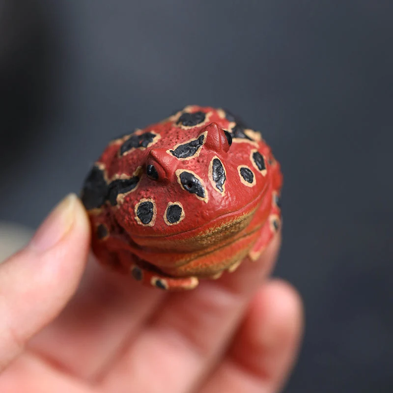 Mascottes de thé poison grenouille en argile