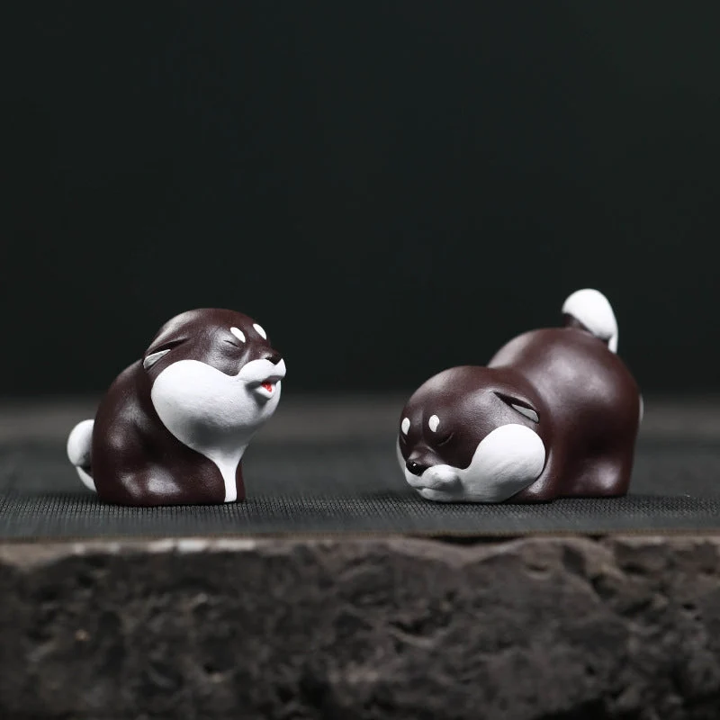 Mascottes de thé chien dormant en argile