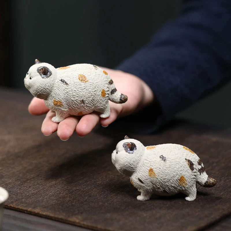 Mascottes de thé white chat en argile