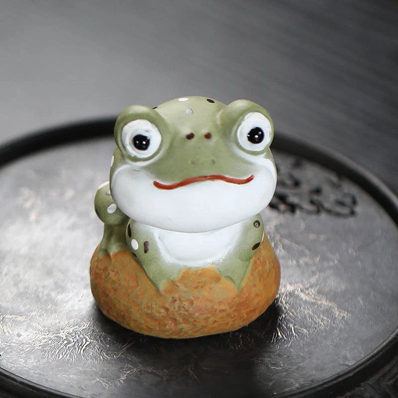 Mascottes de thé frog vert en argile