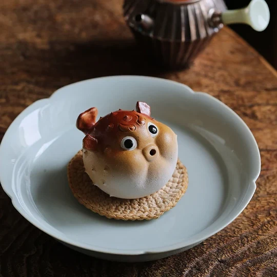 Mascotte de Thé Grue en Céramique