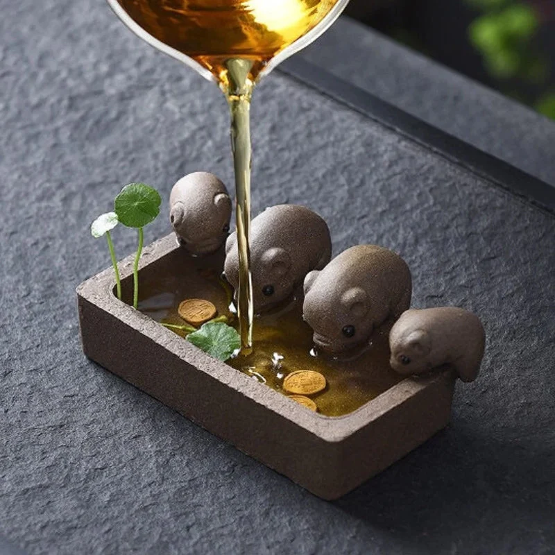Mascottes de thé 4 mini cochons