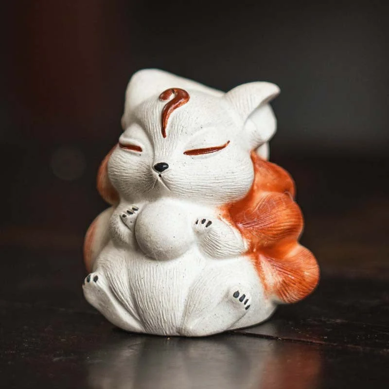Mascottes de thé renard blanc zen