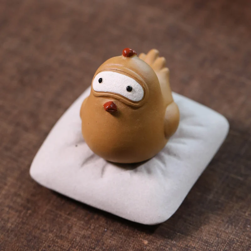 Mascottes de thé coque en argile