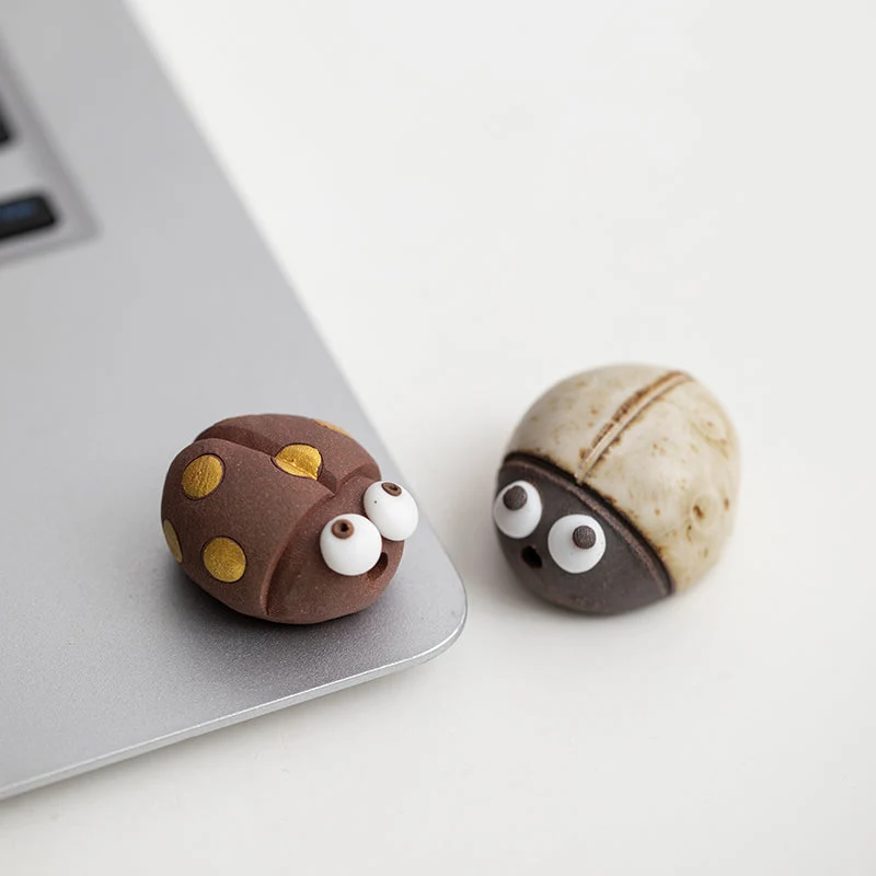 Mascottes de thé coccinelle marron