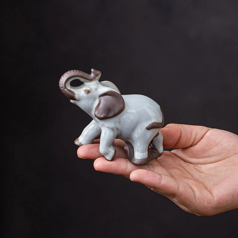 Mascottes de thé éléphant blanc marron