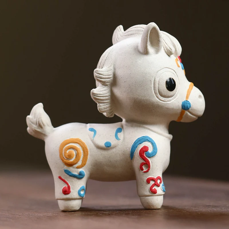 Mascottes de thé chevale blanc en argile