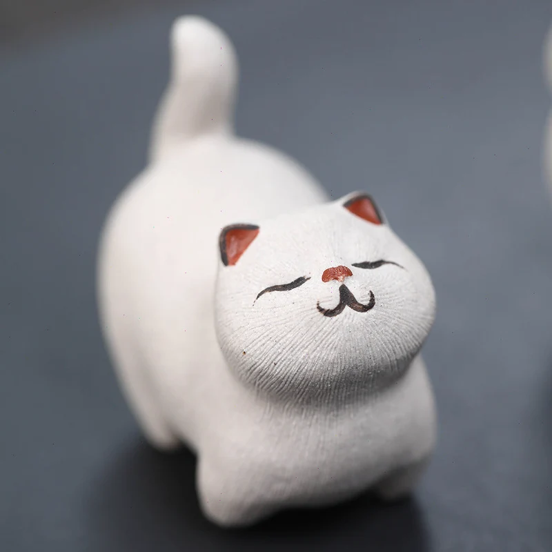 Mascottes de thé chat dormant blanc