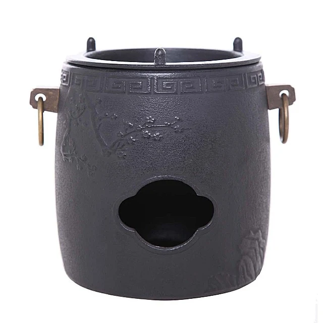 CHAUFFE THÉIÈRE EN FONTE
