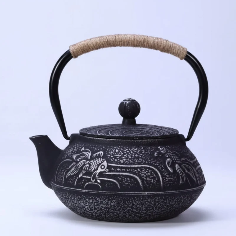 THÉIÈRE EN FONTE POISSONS