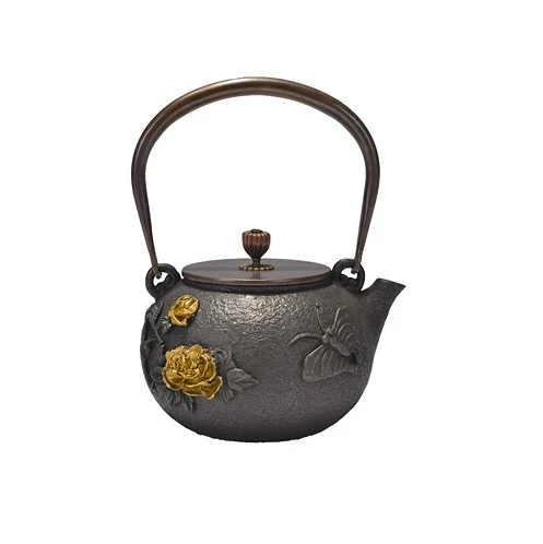 THÉIÈRE EN FONTE ANTIQUE